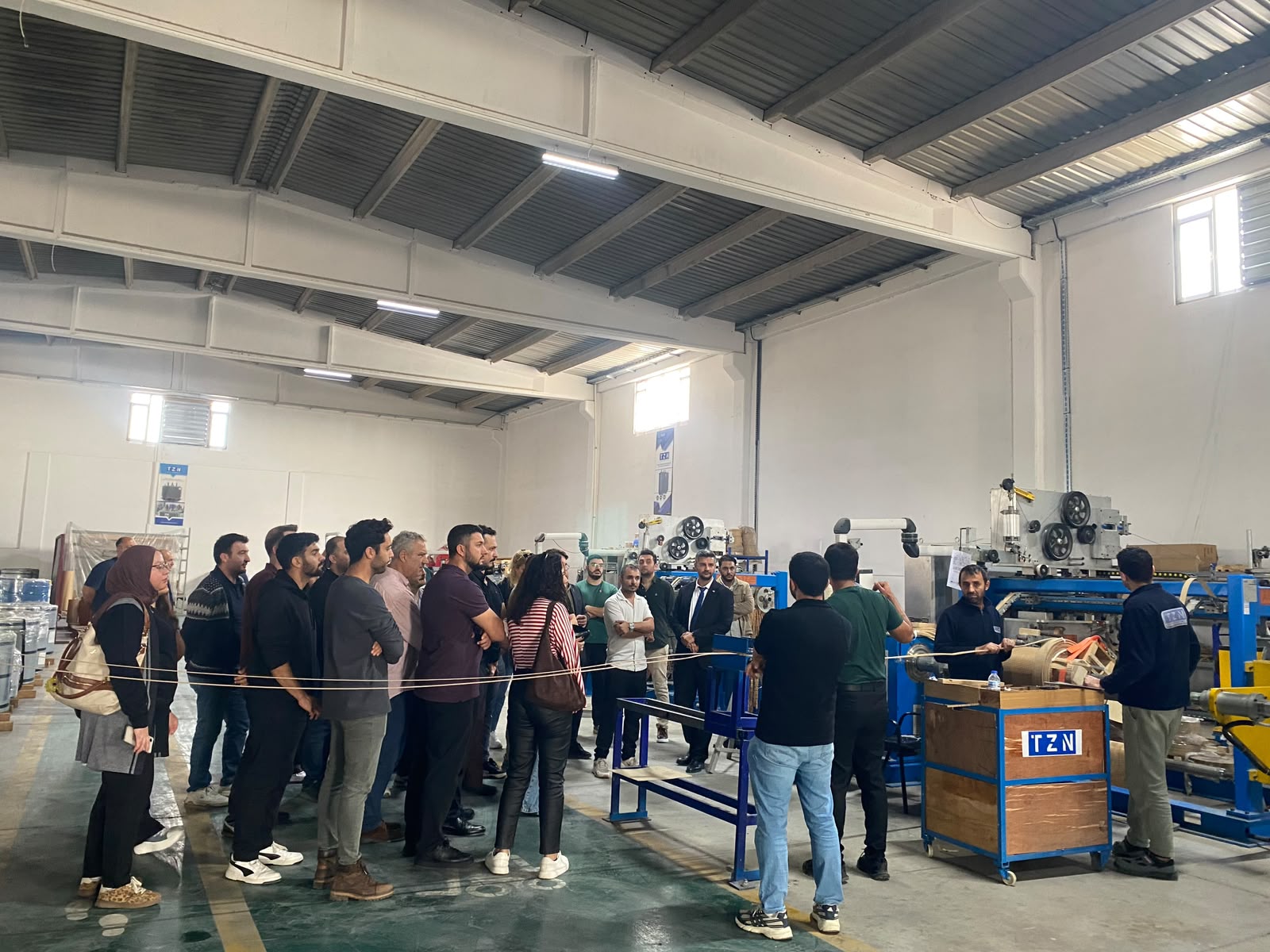 Members of the Mersin Chamber of Electrical Engineers tour the TZN Trafo production area